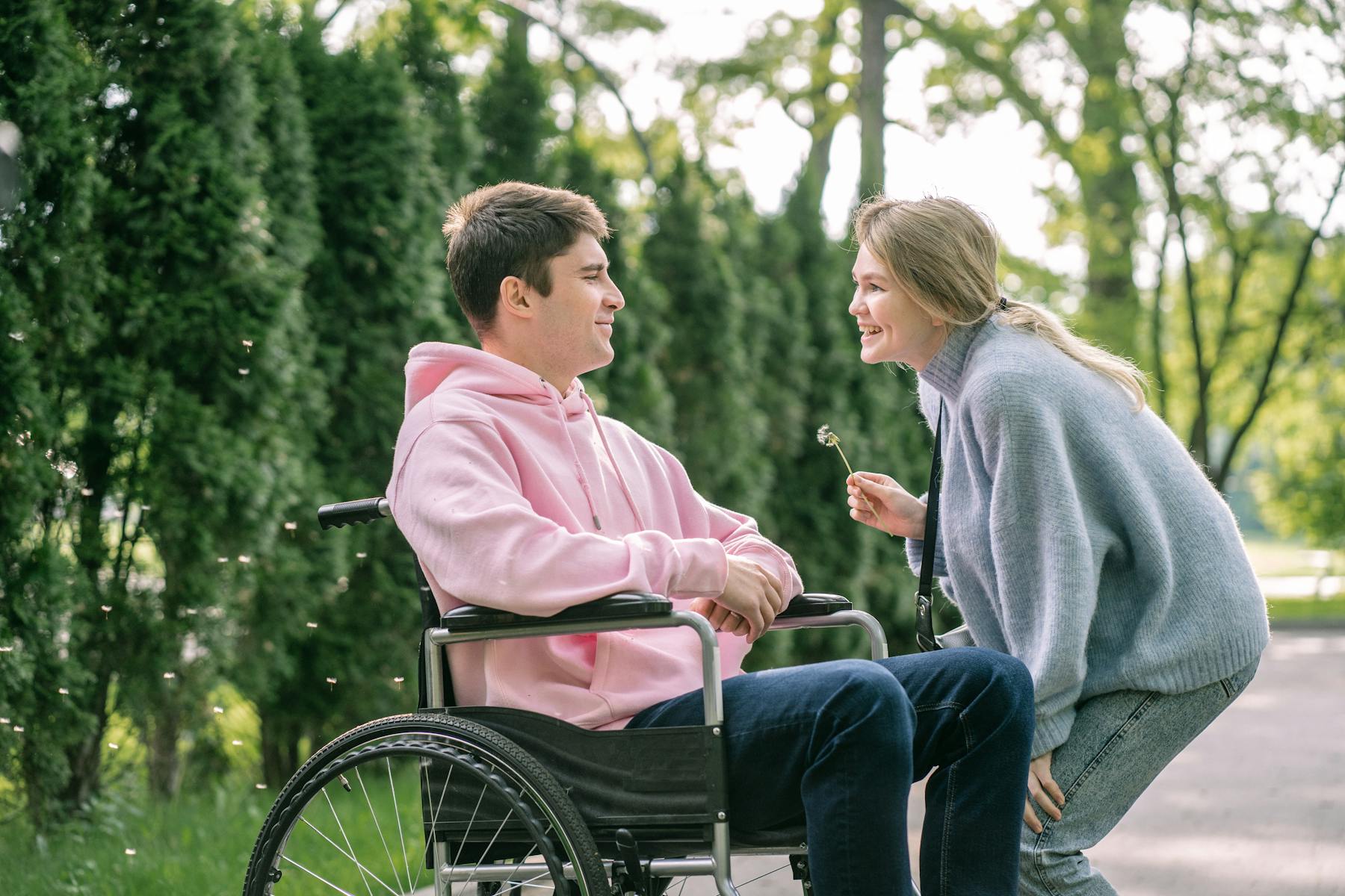 A participant and their support worker spending time together outdoors